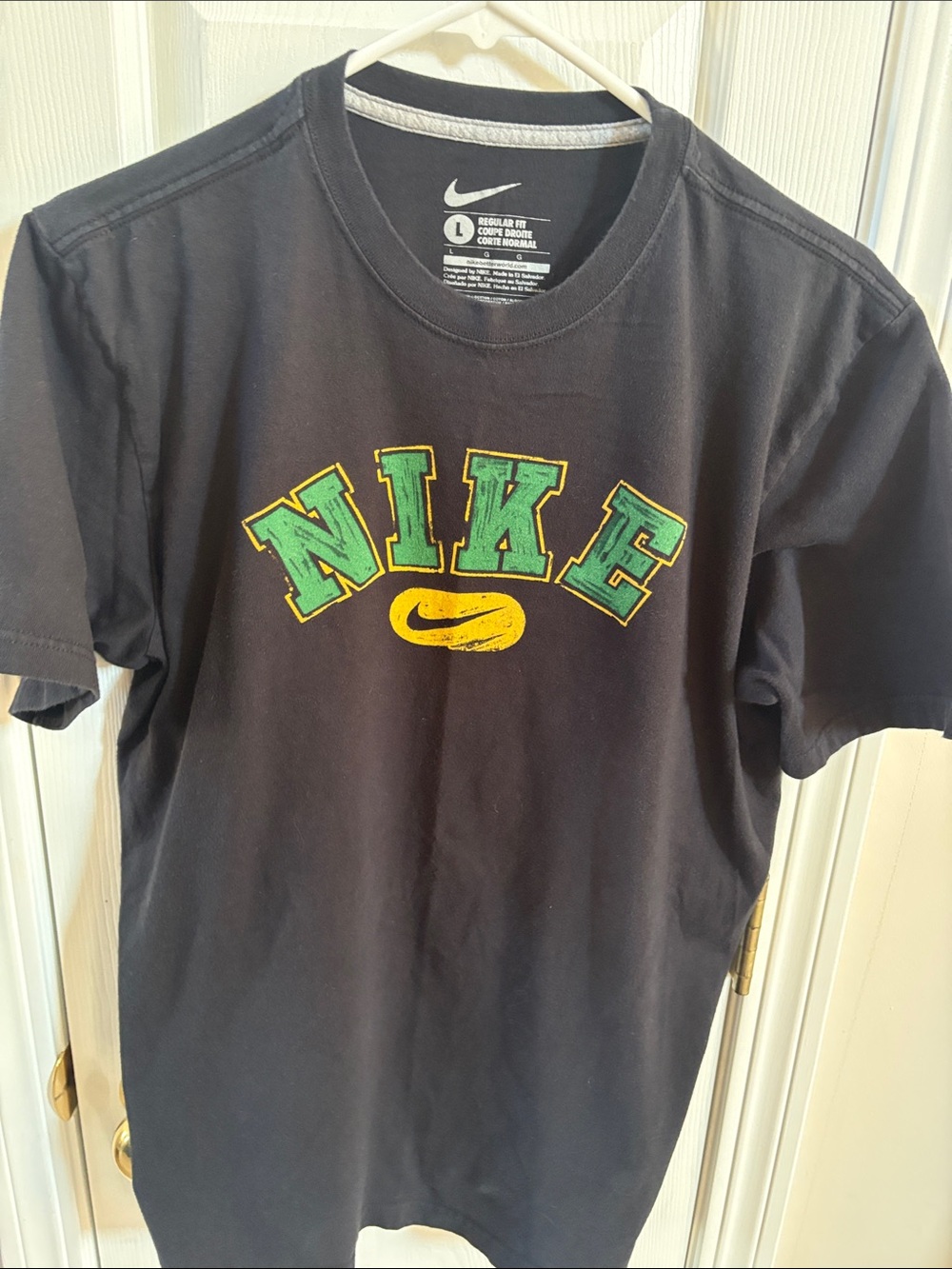 Nike Black Short-Sleeve Tee with Green Lettering and Yellow Swoosh